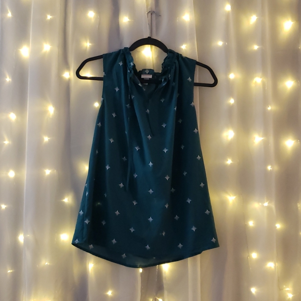 blue green sleeveless blouse